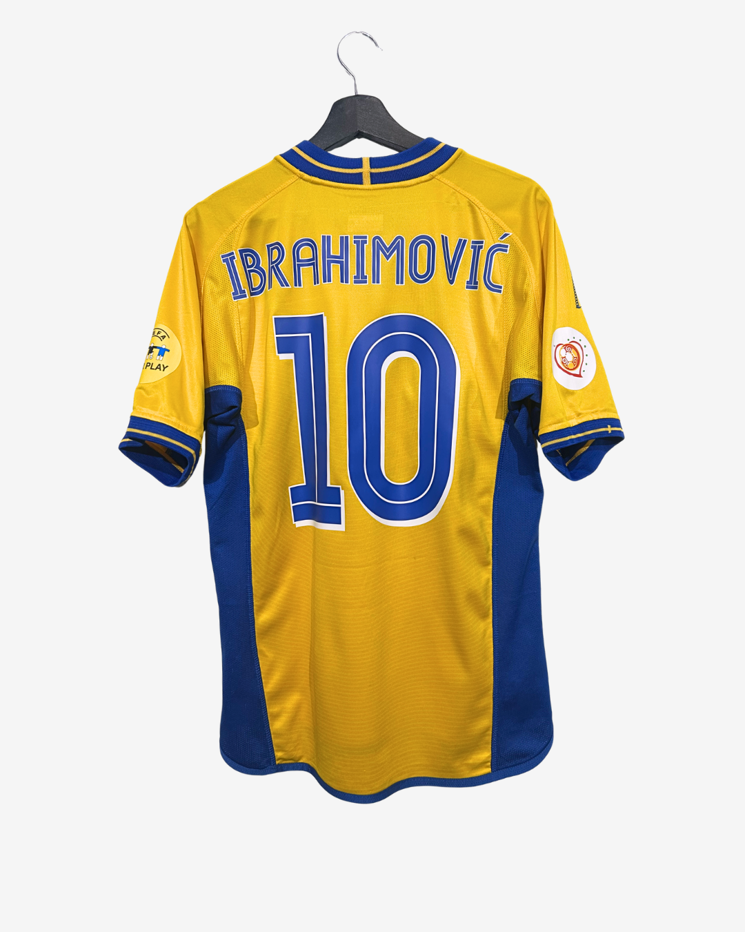 Yellow sports jersey with blue accents and 'Ibrahimovic' and number '10' on a white background