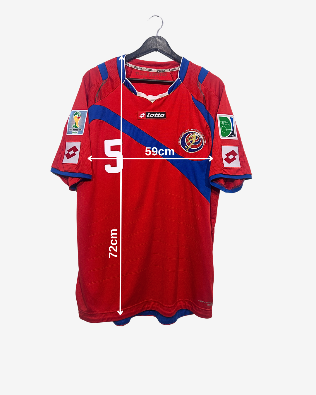 Red sports jersey with blue accents on a hanger, showing measurements.