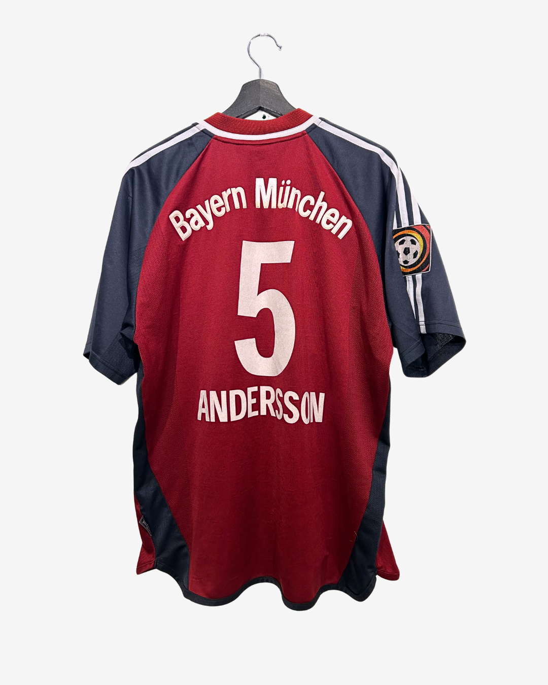 Red and navy Bayern Munich soccer jersey with 'Andersson' and number '5' on a white background