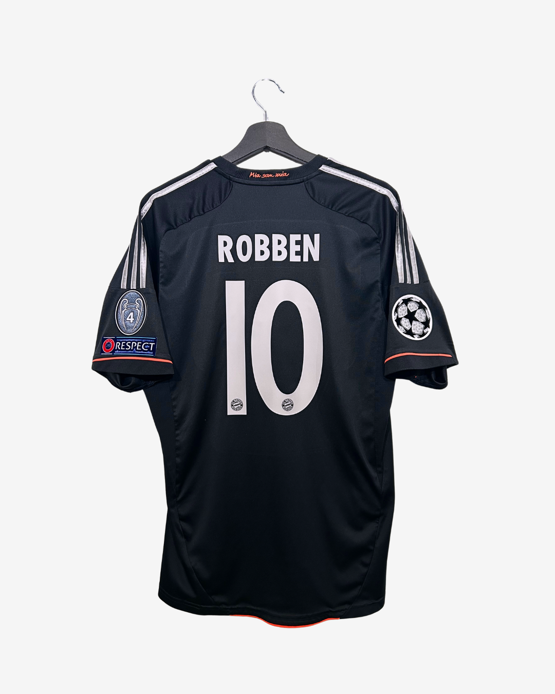 Black sports jersey with 'Robben' and number '10' on a hanger against a white background