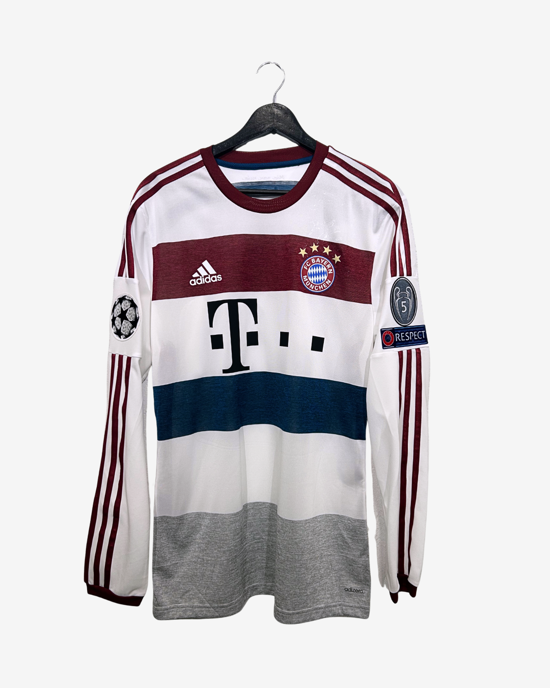 Football jersey with Adidas logo on a hanger against a white background