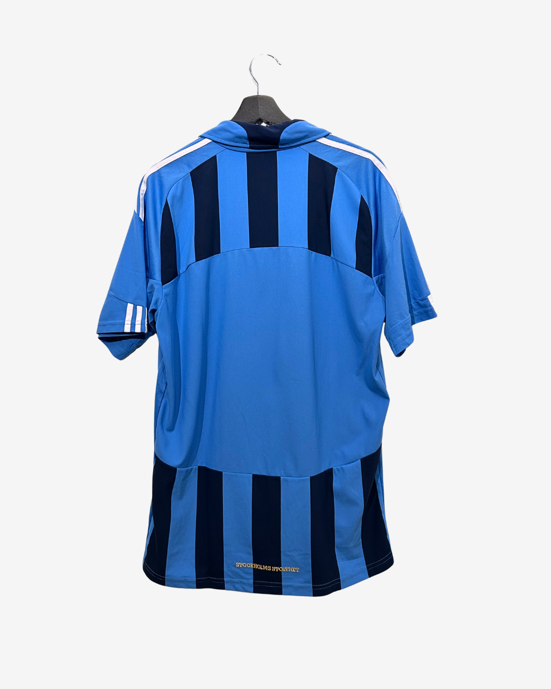 Blue sports jersey with black stripes on a white background
