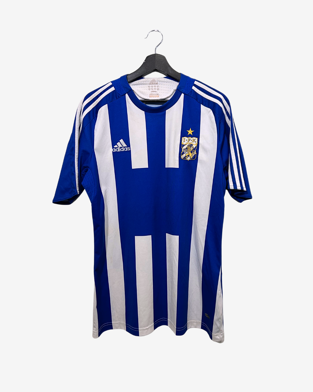 Blue and white striped sports jersey on a hanger with Adidas logo