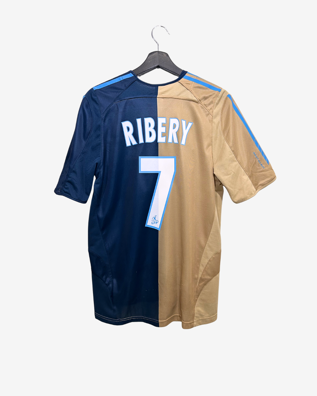 Two-tone sports jersey with 'Ribery' and number '7' on a hanger against a white background