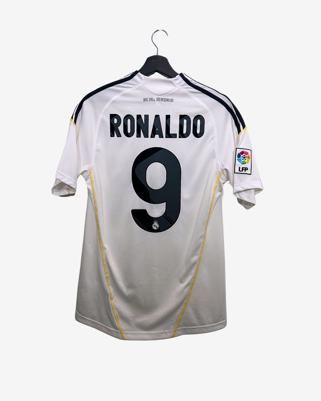 White sports jersey with 'RONALDO' and number '9' on a hanger against a white background