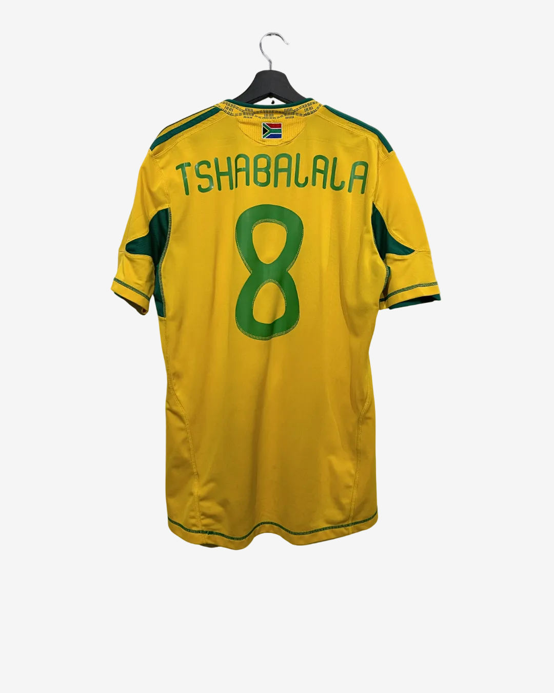 Yellow sports jersey with green accents and 'Tshabalala' and number '8' on a white background