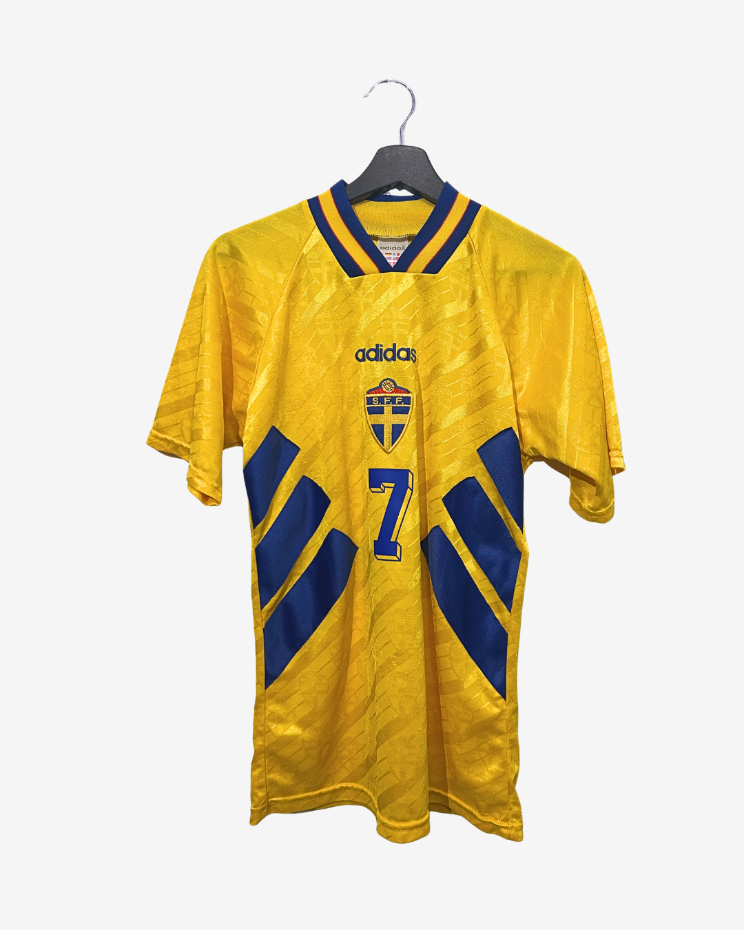 Yellow sports jersey with blue accents and Adidas logo on a white background