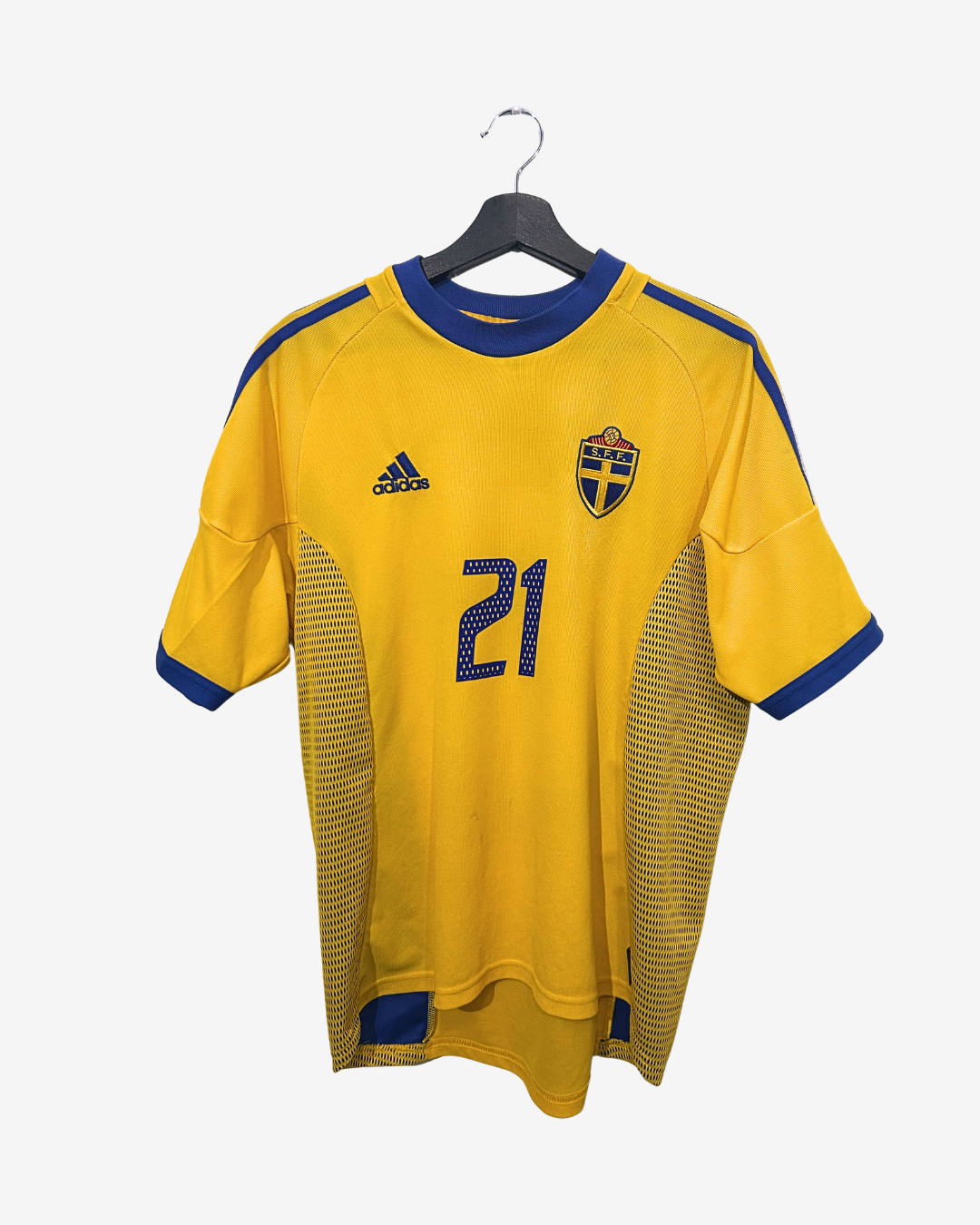 Yellow soccer jersey with blue accents and number 21 on a hanger against a white background