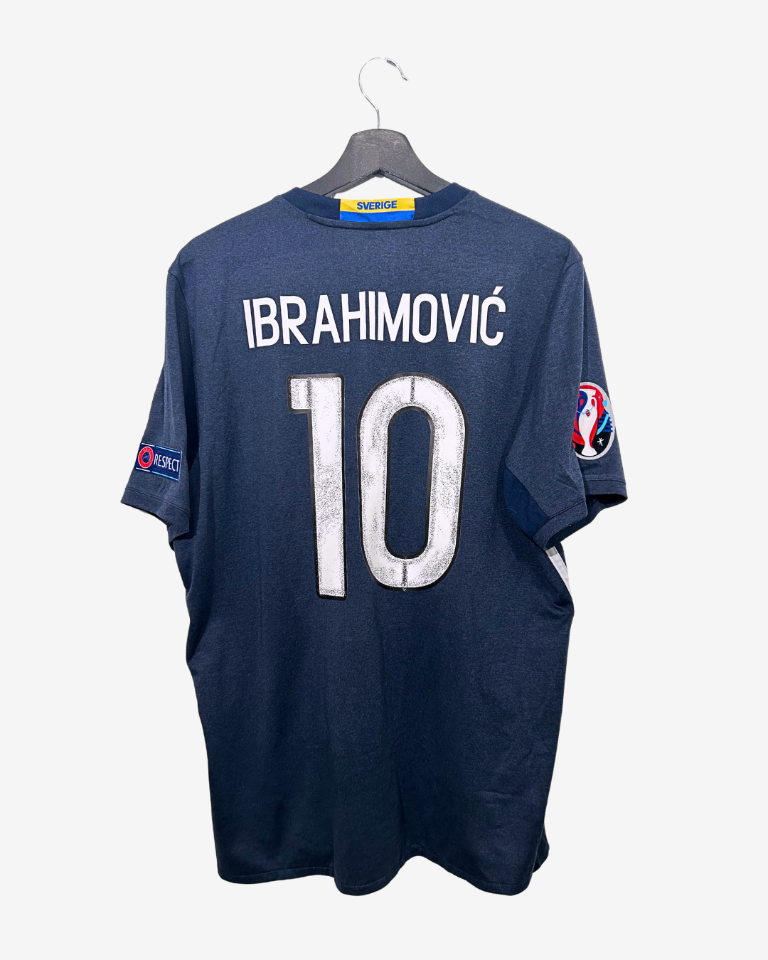 Navy blue sports jersey with 'Ibrahimovic' and number '10' on a white background