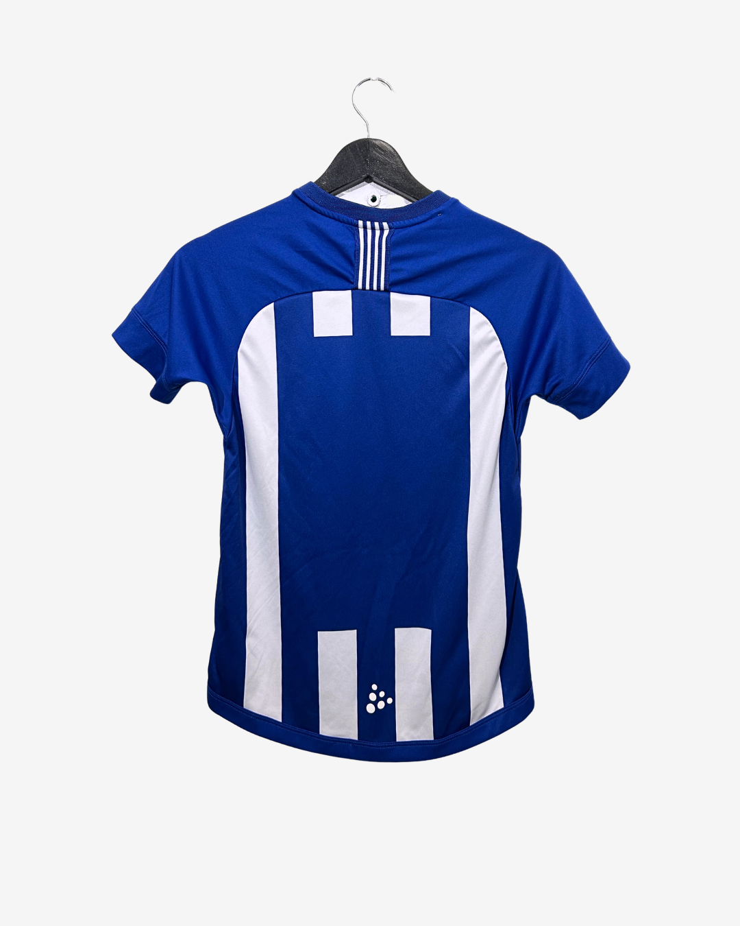 Blue and white sports jersey on a hanger with Adidas logo