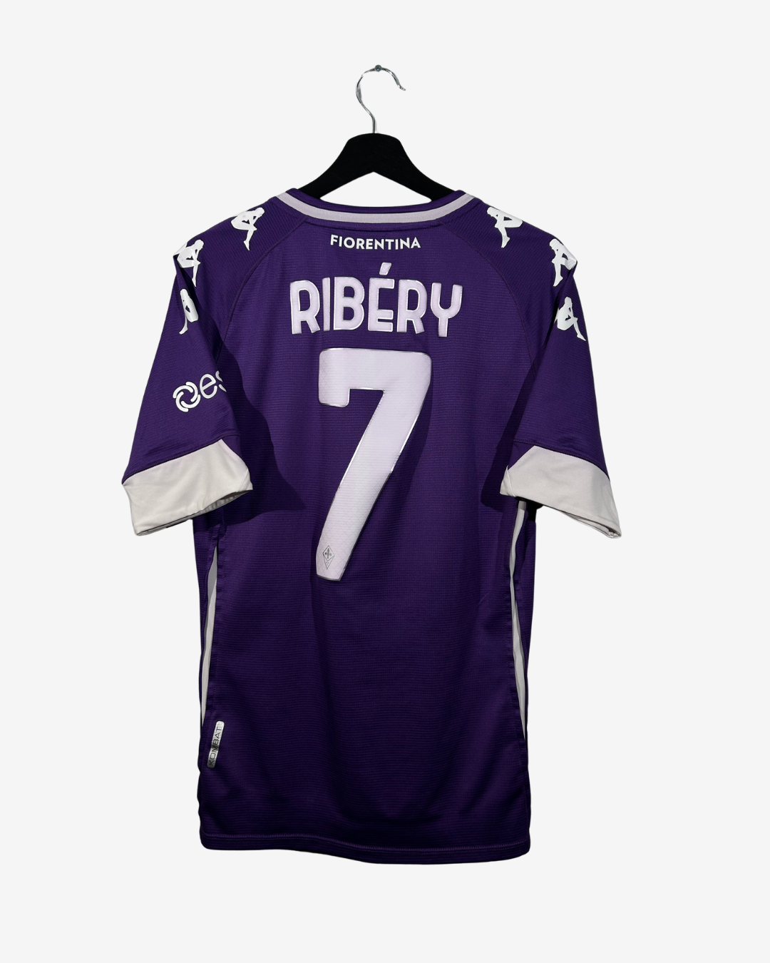 Purple football jersey with 'Ribéry' and number '7' on a hanger against a white background