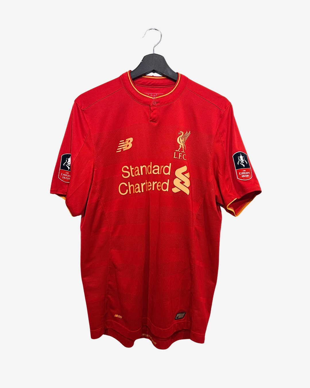 Red sports jersey with branding on a white background