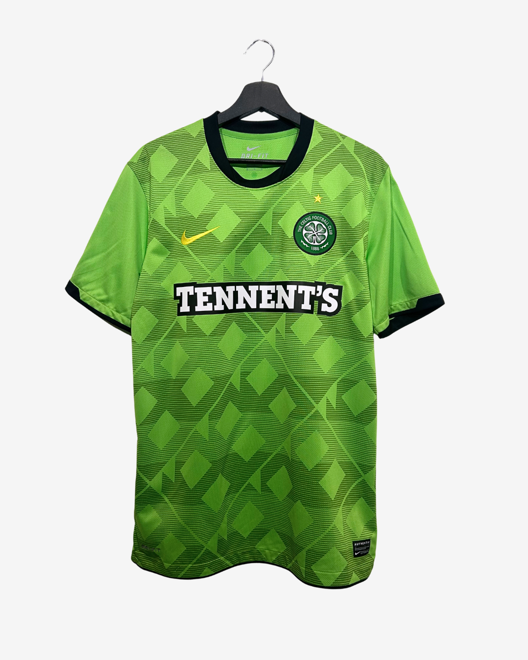 Green sports jersey with black accents on a hanger against a white background