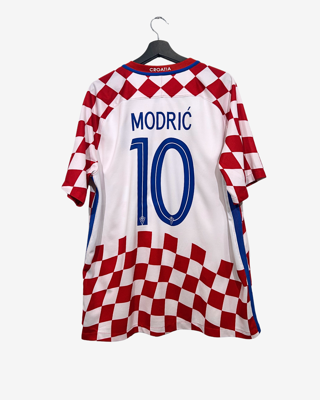 Croatian soccer jersey with 'Modric' and number '10' on a hanger