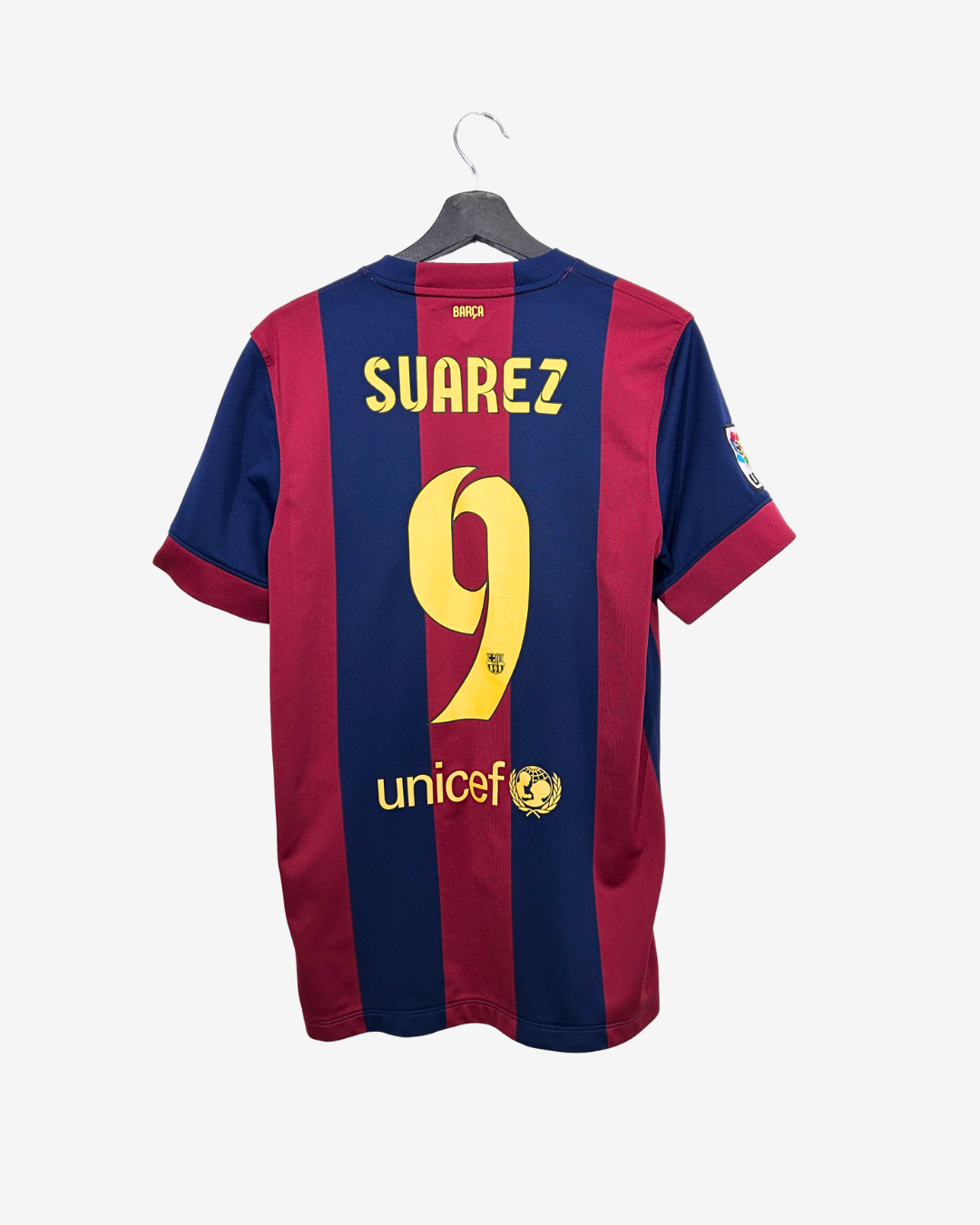 Blue and red sports jersey with 'Suarez' and number '9' on a white background