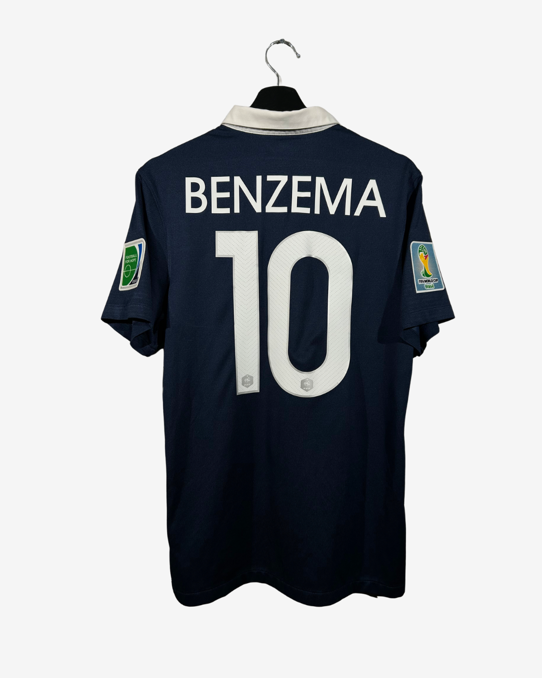 Black sports jersey with 'Benzema' and number '10' on a white background