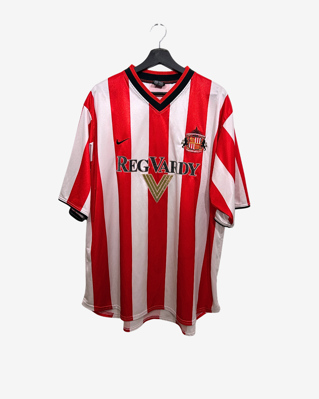 Red and white striped sports jersey with visible branding on a hanger against a white background