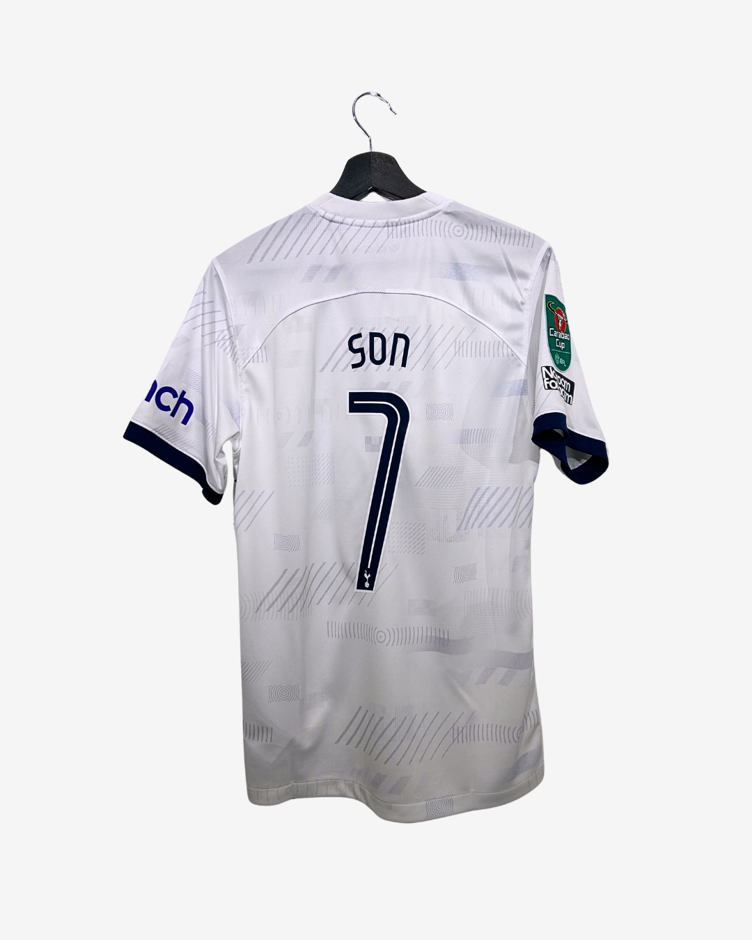 White sports jersey with 'SON' and number '7' on a hanger against a white background