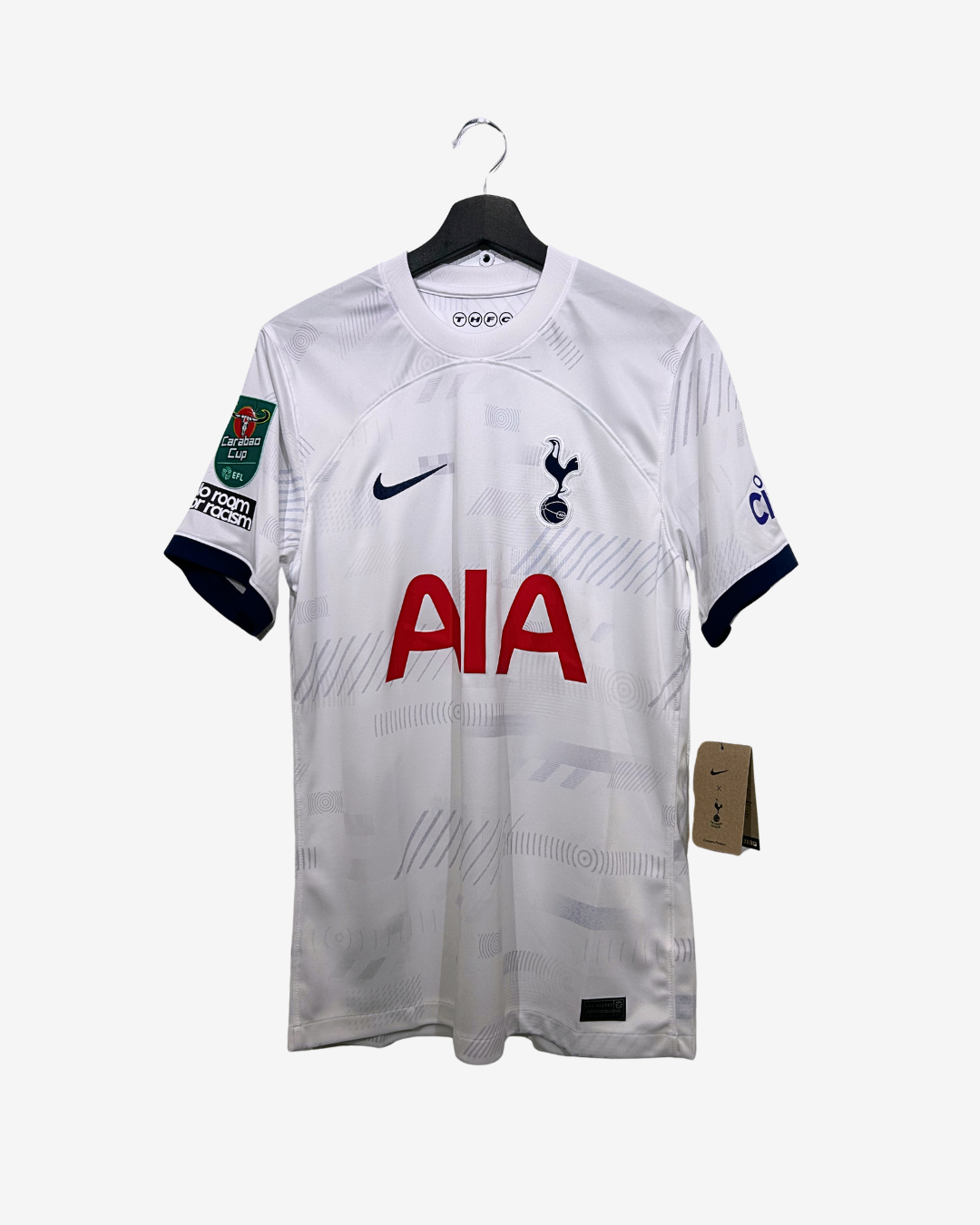 White sports jersey with red 'AIA' logo on a hanger against a white background