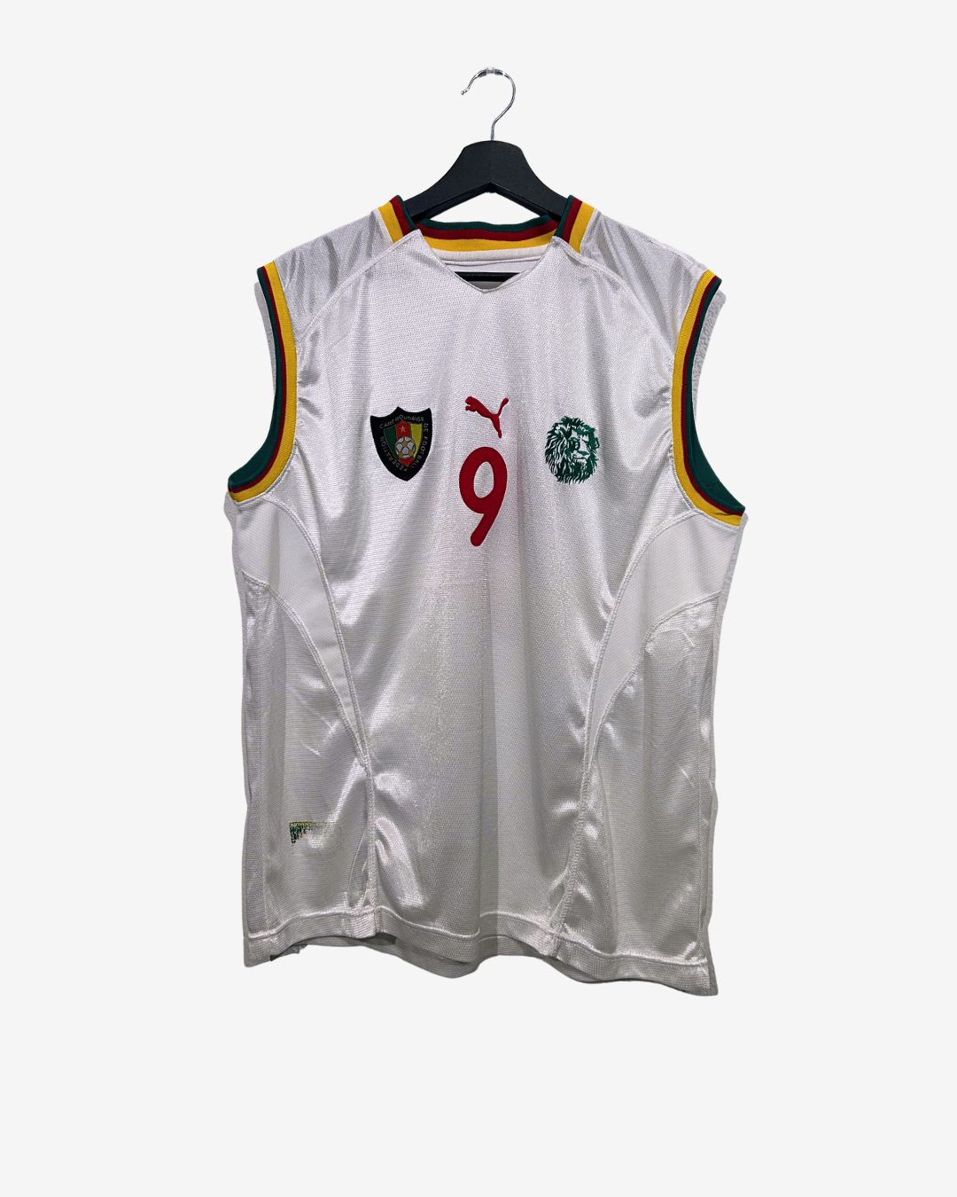 White sleeveless sports jersey with logos on a hanger against a white background