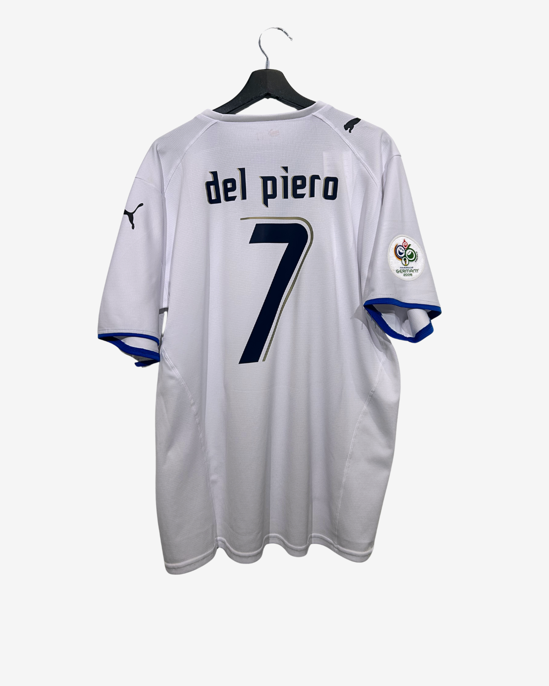 White soccer jersey with 'del Piero' and number '7' on a hanger against a white background