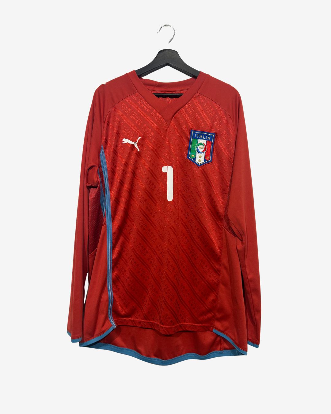Red sports jersey with number 1 on a hanger against a white background