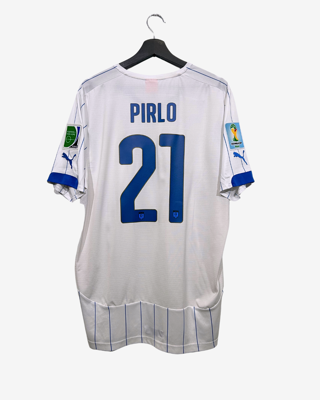 White soccer jersey with 'Pirlo' and number '21' on a hanger against a white background