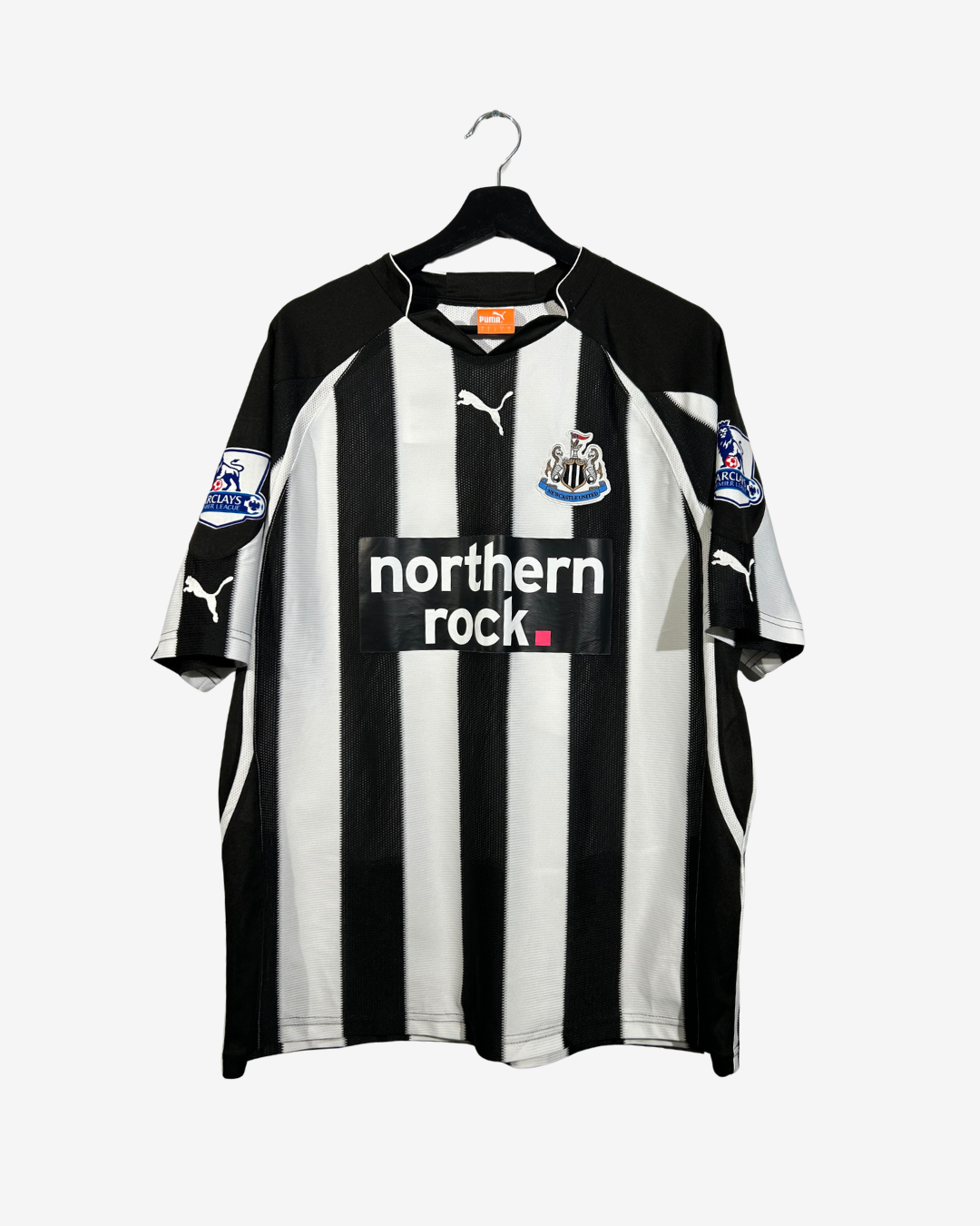 Puma-NewcastleUnited2010_11HomeFootballShirt_BENARFA_front