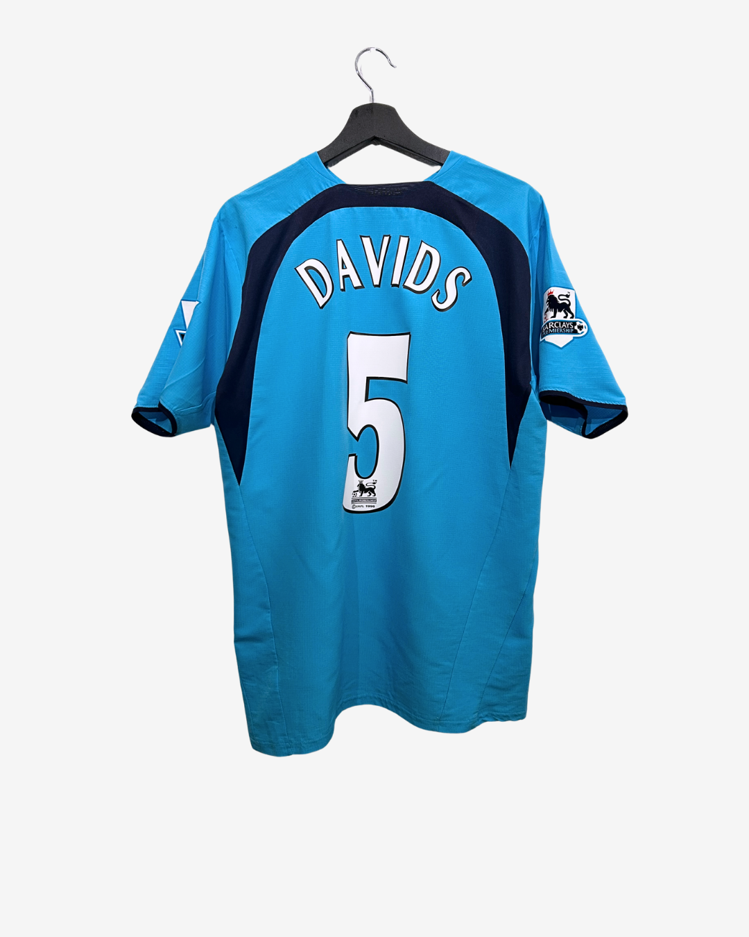 Blue sports jersey with 'DAVIDS' and number '5' on a hanger against a white background