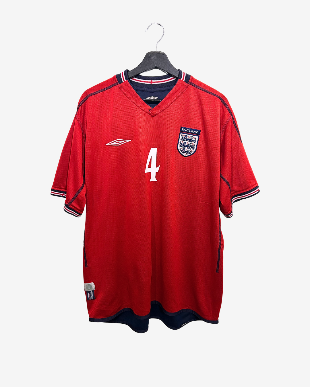 Red sports jersey with number 4 and logo on a hanger against a white background