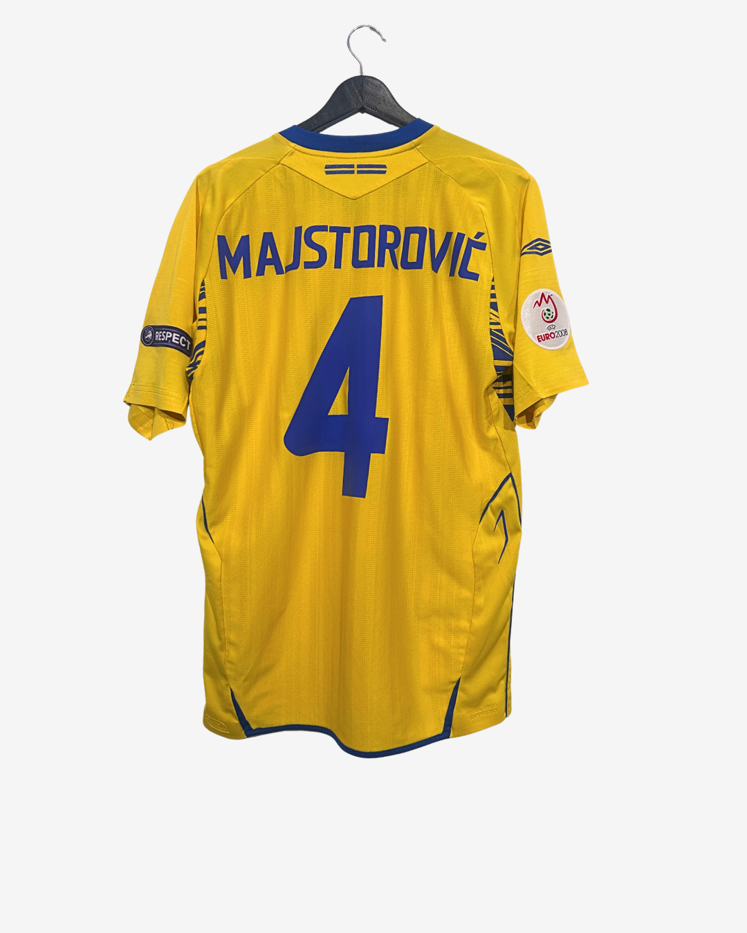 Yellow sports jersey with blue lettering and number on a hanger against a white background