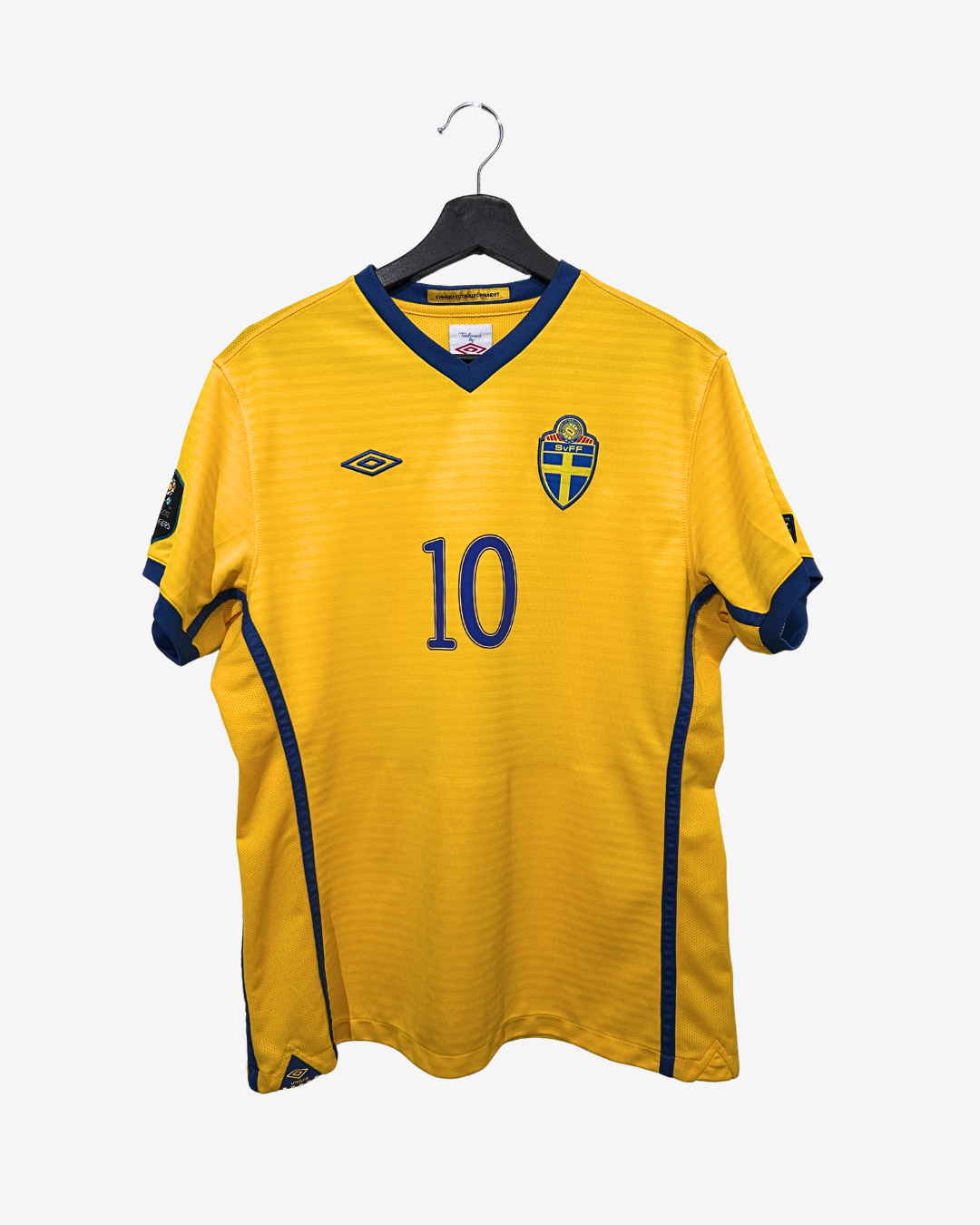 Yellow sports jersey with blue accents and number 10 on a hanger against a white background