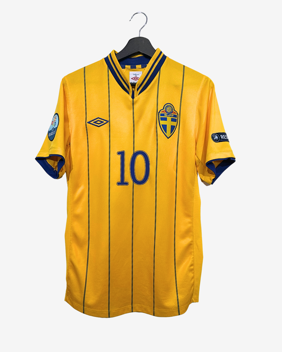 Yellow sports jersey with blue accents and number 10 on a hanger