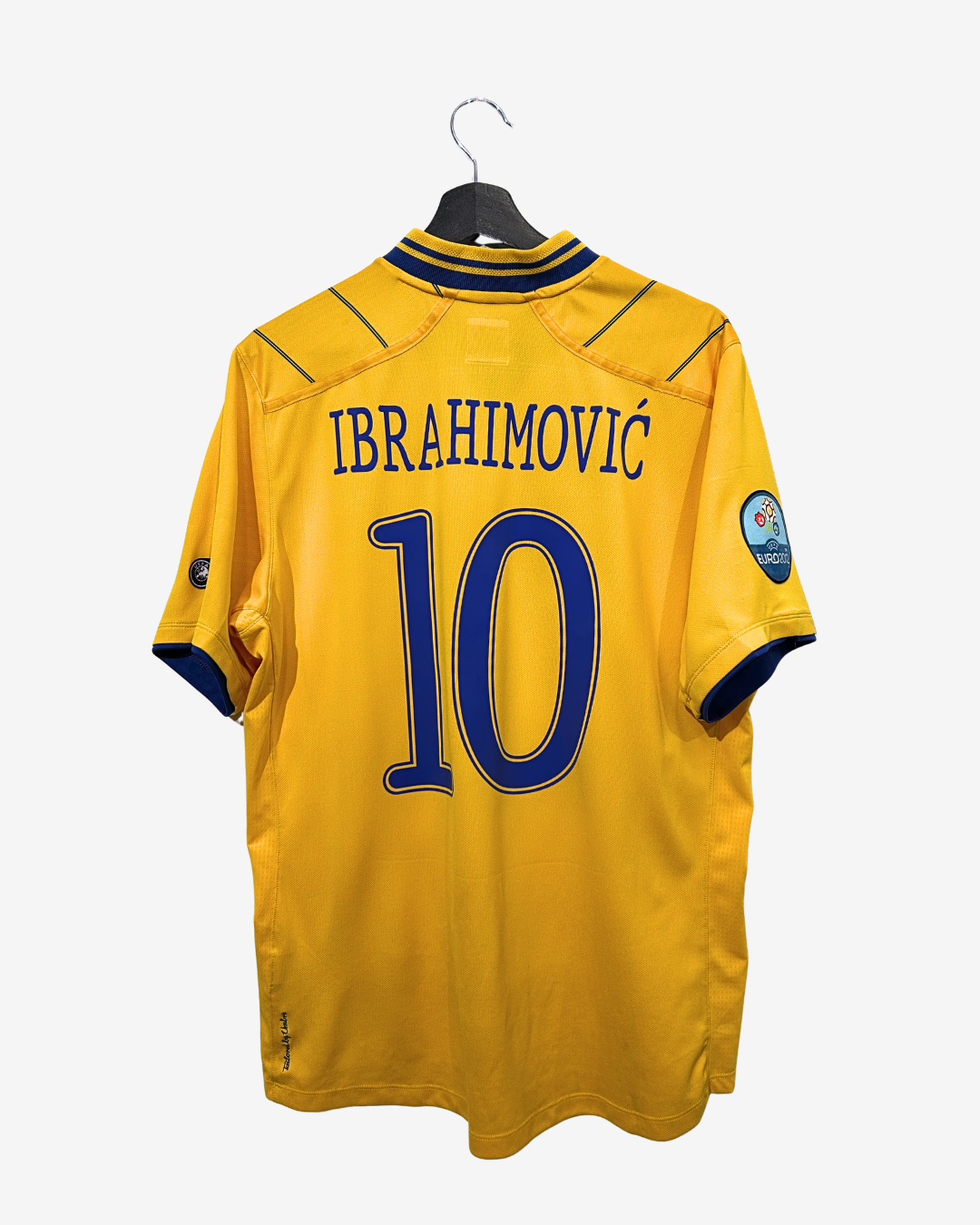 Yellow sports jersey with 'Ibrahimovic' and number '10' on a white background