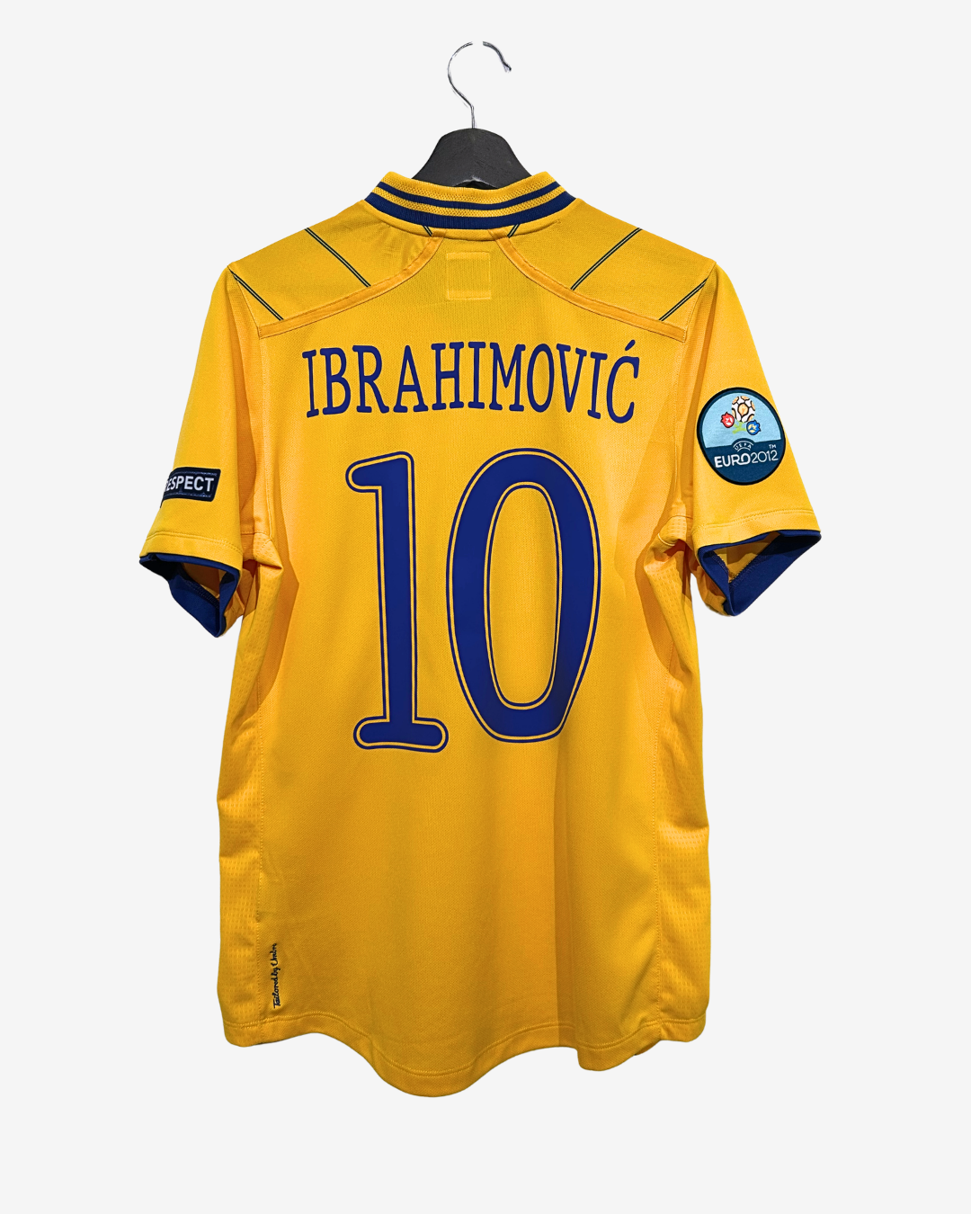 Yellow sports jersey with 'Ibrahimovi|' and number '10' on a hanger
